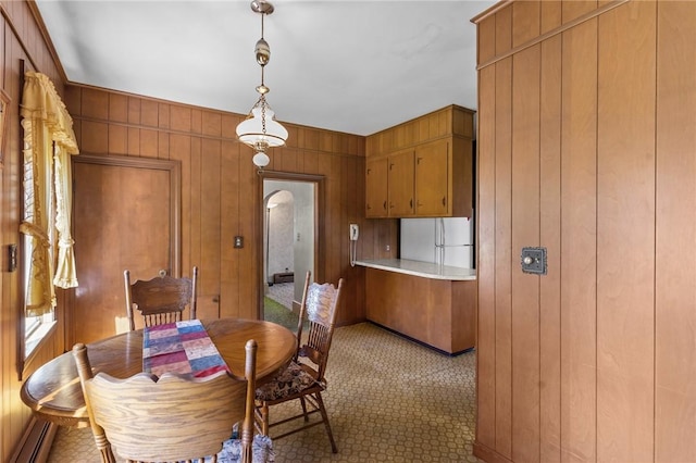8 Tampa St, West Warwick, RI 02893 - dining area with wood walls and baseboard heating