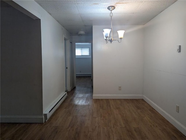 300 Smithfield Rd Unit P2-2, North Providence, RI 02904 - unfurnished dining area with baseboard heating, a baseboard radiator, wood finished floors, a chandelier, and baseboards