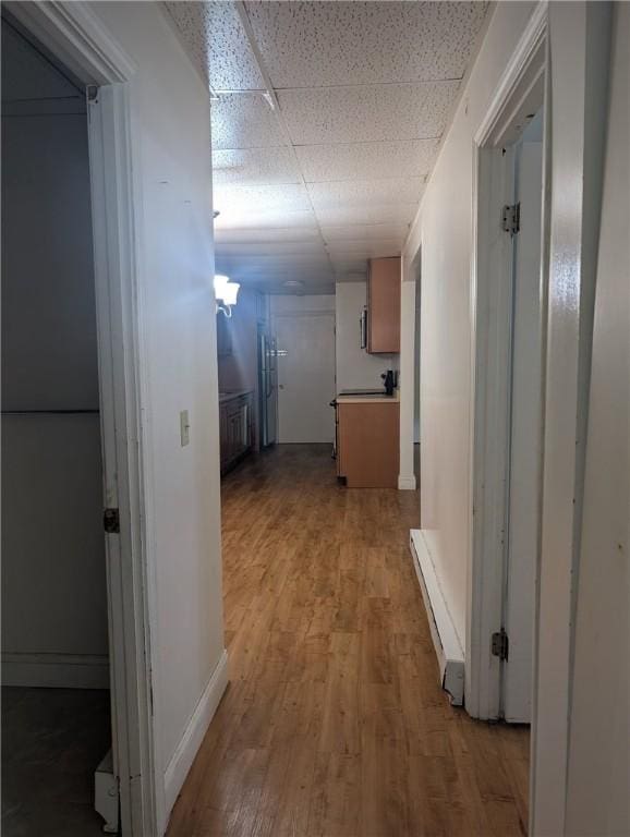 300 Smithfield Rd Unit P2-2, North Providence, RI 02904 - hall featuring light wood-style flooring, a paneled ceiling, and baseboards