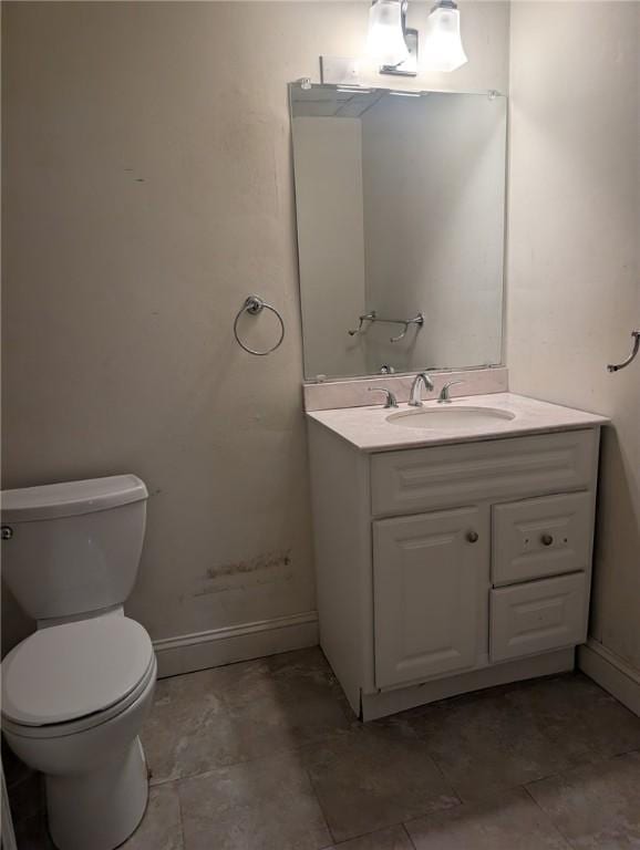 300 Smithfield Rd Unit P2-2, North Providence, RI 02904 - bathroom with vanity, toilet, and baseboards