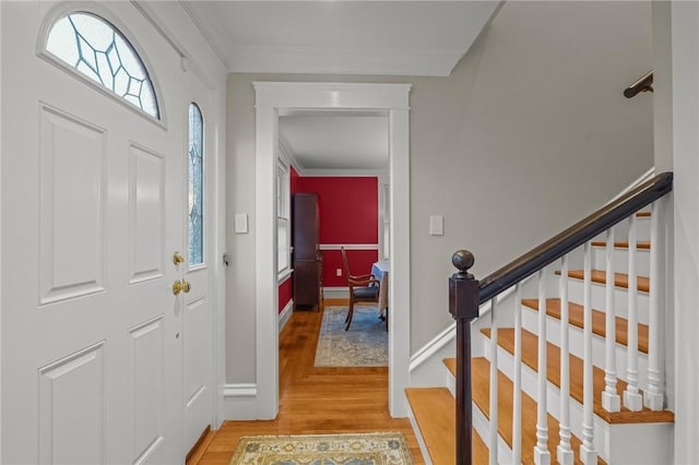 11 Elmcroft Ave, Providence, RI 02909 - foyer entrance with ornamental molding, light wood-type flooring, stairway, and baseboards