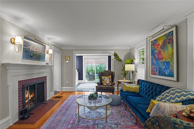 11 Elmcroft Ave, Providence, RI 02909 - living room with a brick fireplace, ornamental molding, baseboards, and wood finished floors