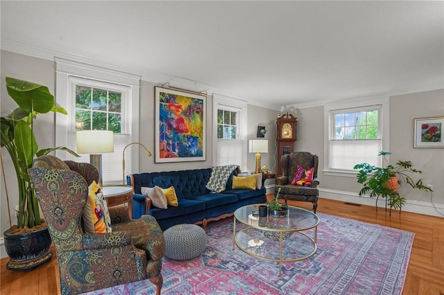 11 Elmcroft Ave, Providence, RI 02909 - living room with healthy amount of natural light, crown molding, and baseboards