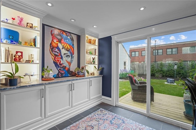 11 Elmcroft Ave, Providence, RI 02909 - doorway featuring dark tile patterned floors, recessed lighting, ornamental molding, and baseboards