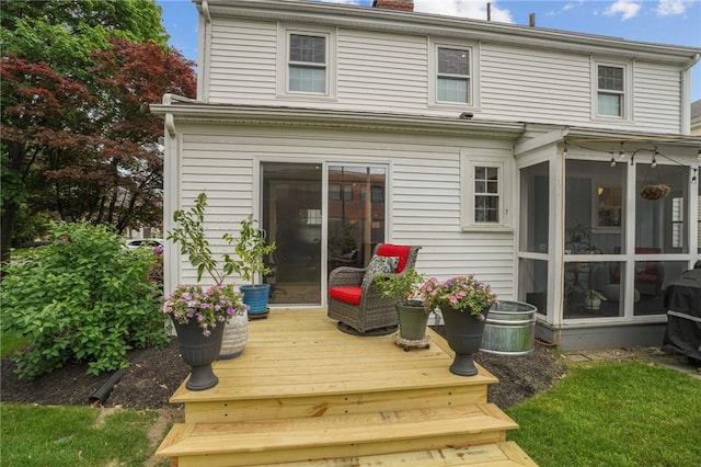 11 Elmcroft Ave, Providence, RI 02909 - back of house with a sunroom, a chimney, and a deck