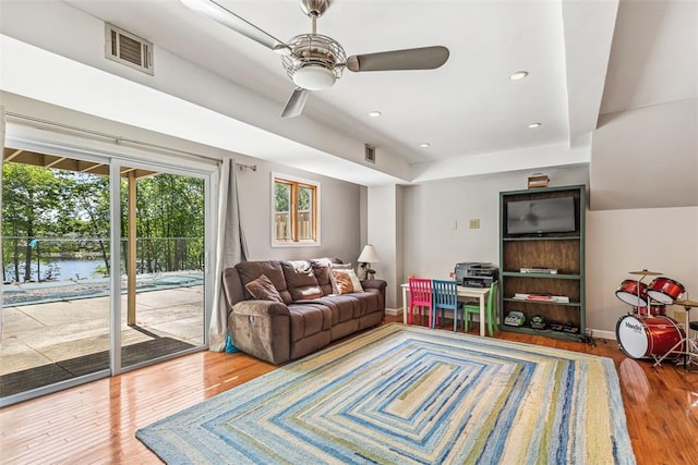 11 Noto Dr, North Providence, RI 02904 - living room with ceiling fan, wood finished floors, recessed lighting, and a water view