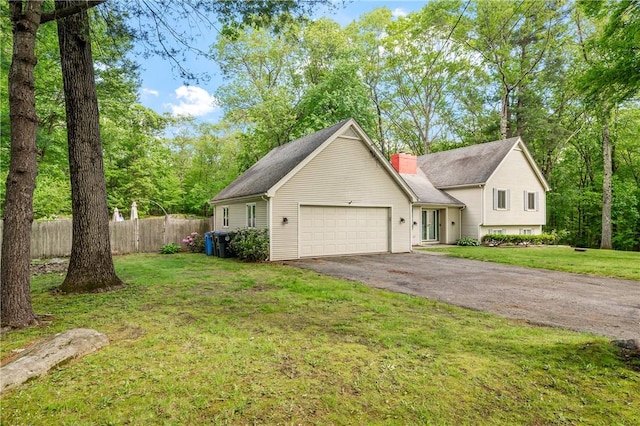 8 Westgate Rd, Cumberland, RI 02864 - view of front of home with driveway, an attached garage, and a chimney