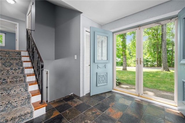 8 Westgate Rd, Cumberland, RI 02864 - entryway with stone tile flooring and stairway