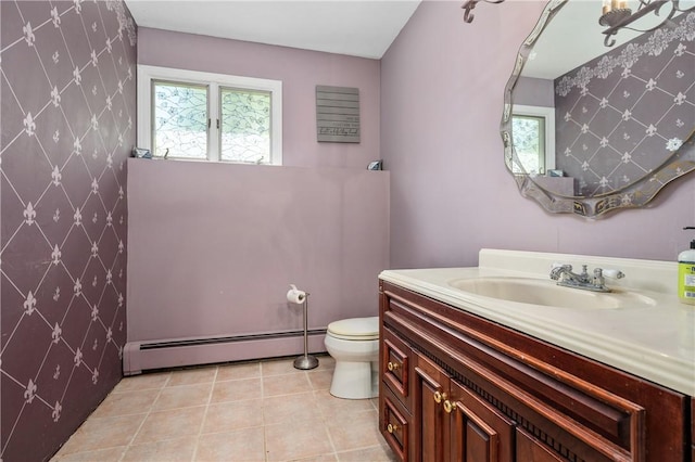 8 Westgate Rd, Cumberland, RI 02864 - bathroom featuring a baseboard heating unit, vanity, toilet, plenty of natural light, and wallpapered walls