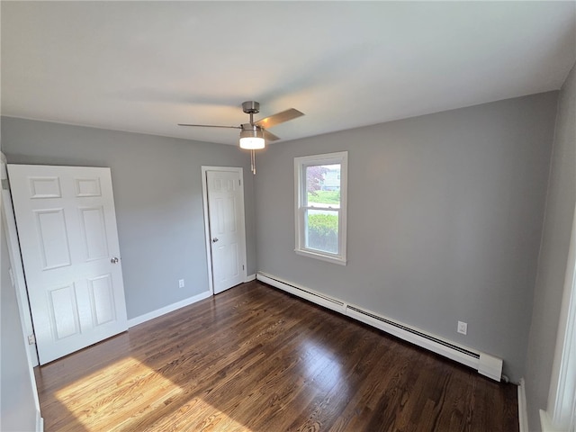 119 Evergreen Ave, Tiverton, RI 02878 - unfurnished bedroom with a baseboard radiator, dark wood-type flooring, baseboards, and a ceiling fan