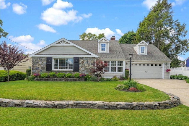 25 King Philip Rd, Pawtucket, RI 02861 - view of front of property featuring driveway, an attached garage, stone siding, a chimney, and a shingled roof