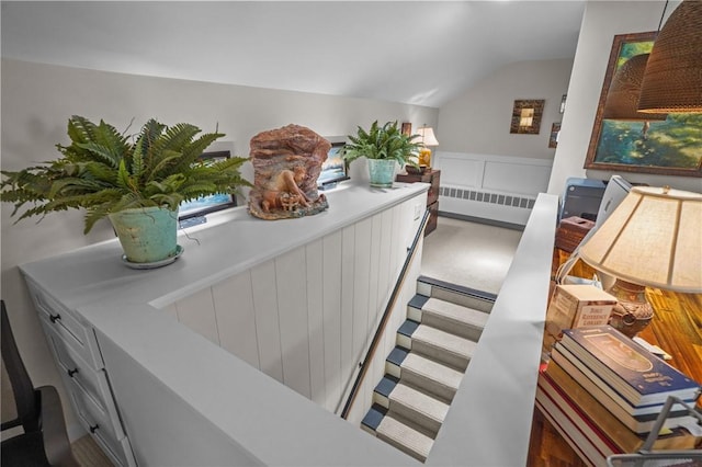 25 King Philip Rd, Pawtucket, RI 02861 - interior space with radiator and lofted ceiling
