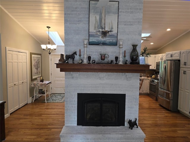 190 Broad Rock Rd, South Kingstown, RI 02879 - living room with vaulted ceiling, dark wood-style floors, a brick fireplace, recessed lighting, and a skylight