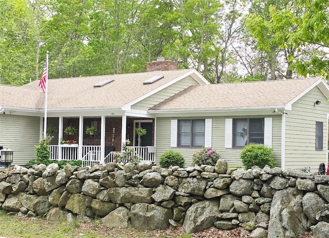 190 Broad Rock Rd, South Kingstown, RI 02879 - single story home featuring a chimney and roof with shingles