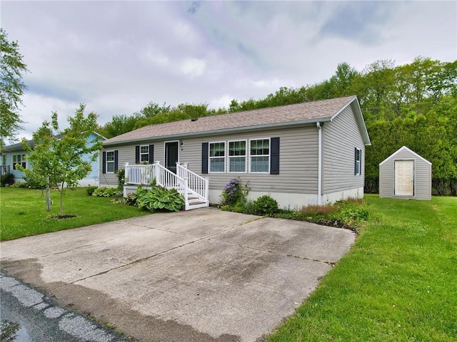 40 Songbird Ln, Tiverton, RI 02878 - view of front facade with a front lawn