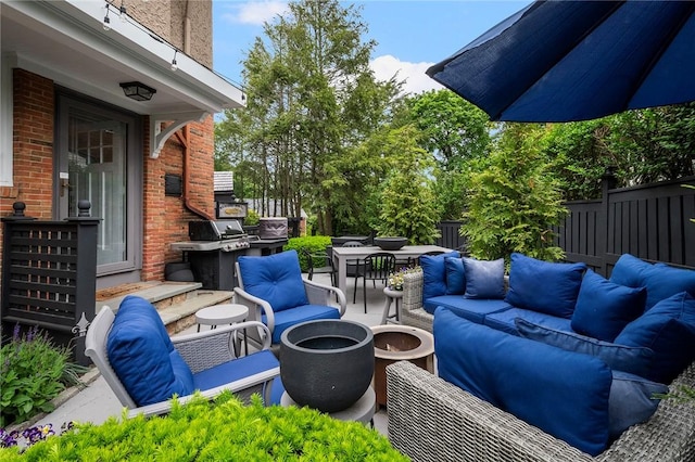34 Dryden Ave, Pawtucket, RI 02860 - view of patio / terrace featuring an outdoor living space with a fire pit, area for grilling, and outdoor dining space