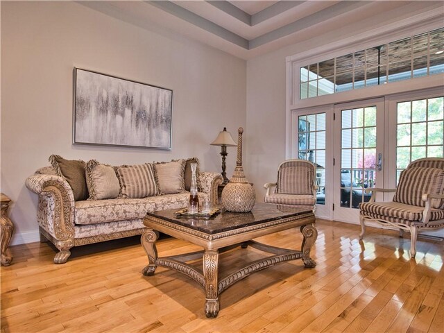 51 W Ridge Dr, Tiverton, RI 02878 - living area with light wood finished floors and a high ceiling