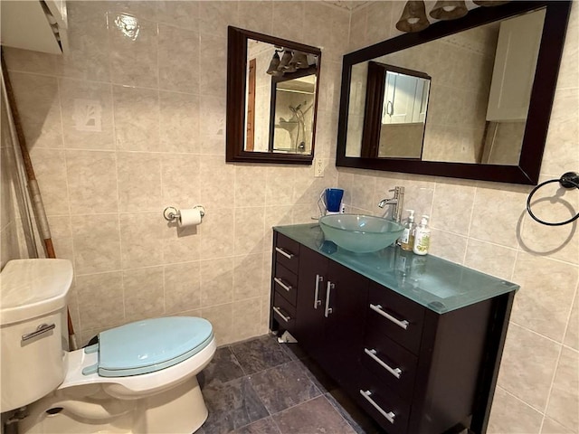 3945 Post Rd, Warwick, RI 02886 - bathroom with tile walls, toilet, and vanity