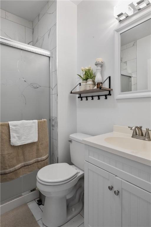 15 Ruggles St, Providence, RI 02908 - full bathroom with vanity, toilet, and a stall shower