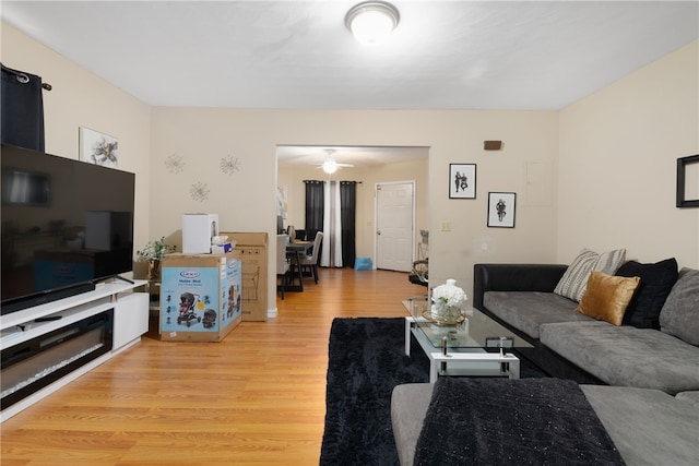 22 Myrtle St, Pawtucket, RI 02860 - living room featuring light wood-type flooring and a ceiling fan
