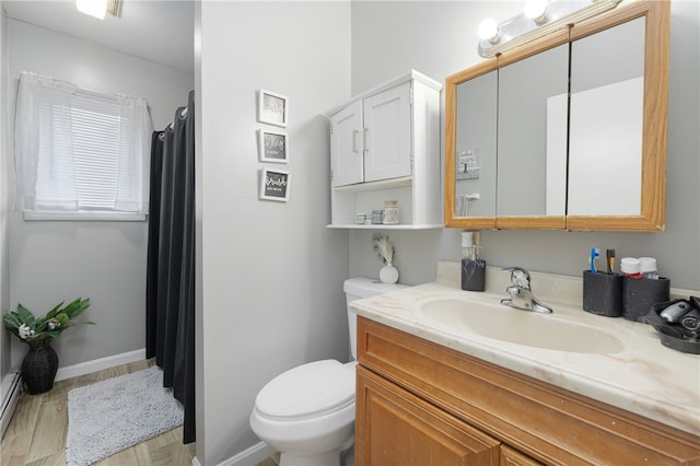 22 Myrtle St, Pawtucket, RI 02860 - bathroom with vanity, toilet, baseboards, a shower with shower curtain, and a baseboard radiator
