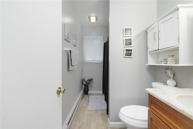 22 Myrtle St, Pawtucket, RI 02860 - full bathroom featuring a baseboard radiator, toilet, vanity, baseboards, and curtained shower