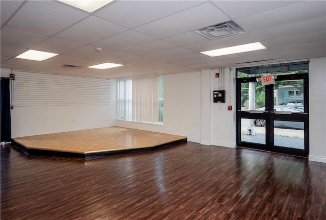 413 High St, Bristol, RI 02809 - empty room with wood finished floors and a drop ceiling