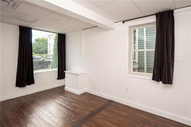 413 High St, Bristol, RI 02809 - unfurnished room with dark wood-style floors and a drop ceiling