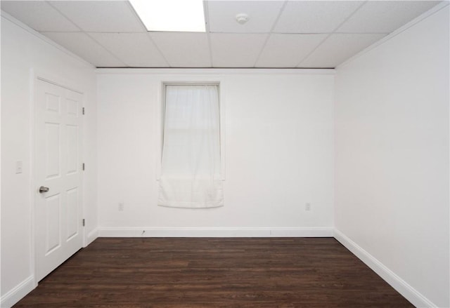 413 High St, Bristol, RI 02809 - unfurnished room with dark wood-style flooring, a paneled ceiling, and a smoke detector