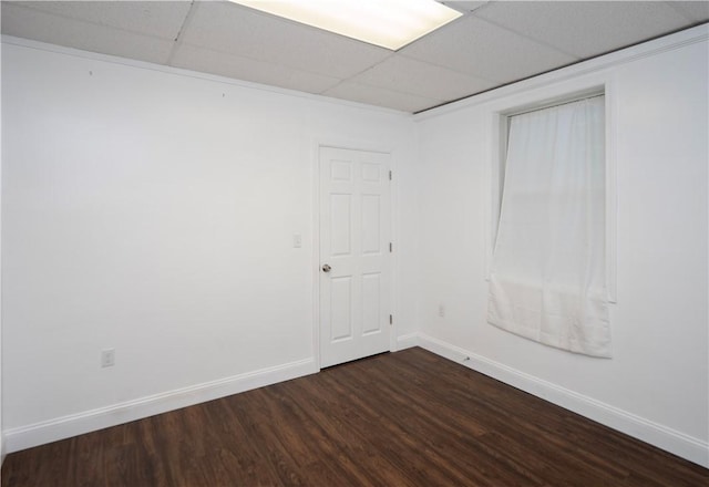 413 High St, Bristol, RI 02809 - spare room with dark wood-type flooring and a paneled ceiling