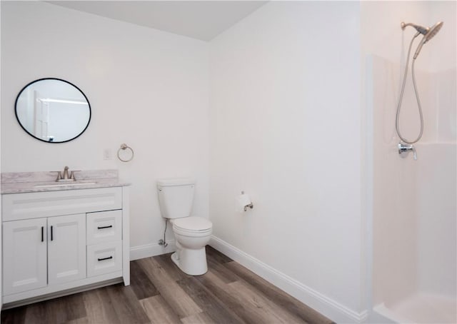 413 High St, Bristol, RI 02809 - bathroom with a shower, wood finished floors, and vanity