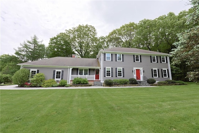 215 Adirondack Dr, East Greenwich, RI 02818 - colonial inspired home featuring a porch and a front yard
