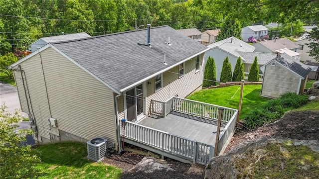 15 Lawnacre Dr, North Providence, RI 02911 - rear view of house with central AC unit, a deck, a shingled roof, and a lawn