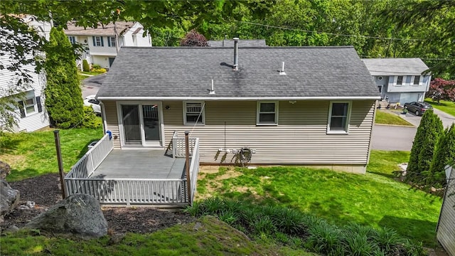 15 Lawnacre Dr, North Providence, RI 02911 - rear view of property featuring roof with shingles, a wooden deck, and a yard