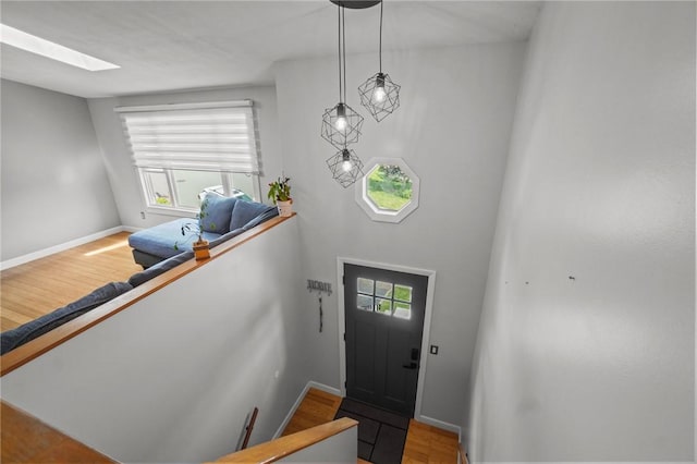15 Lawnacre Dr, North Providence, RI 02911 - foyer featuring wood finished floors, a skylight, and baseboards