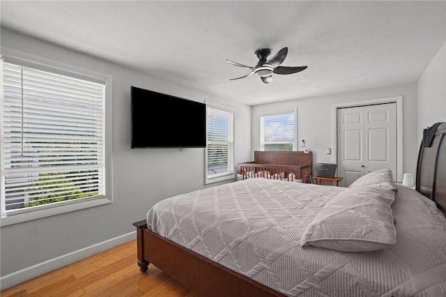 15 Lawnacre Dr, North Providence, RI 02911 - bedroom featuring baseboards, light wood-style flooring, a closet, and ceiling fan