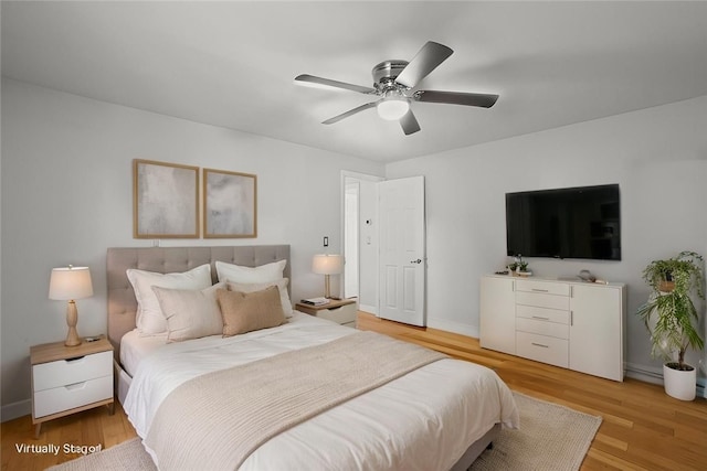15 Lawnacre Dr, North Providence, RI 02911 - bedroom with light wood finished floors, baseboards, and ceiling fan