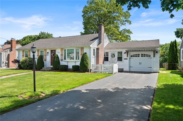 23 Revere St, Pawtucket, RI 02861 - ranch-style house featuring driveway, a garage, and a chimney