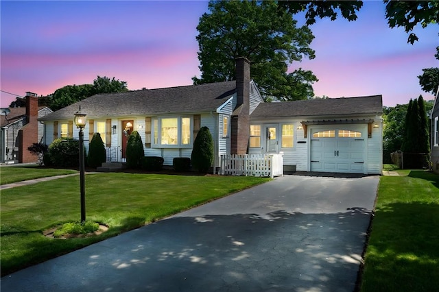 23 Revere St, Pawtucket, RI 02861 - ranch-style house with driveway, a garage, and a chimney