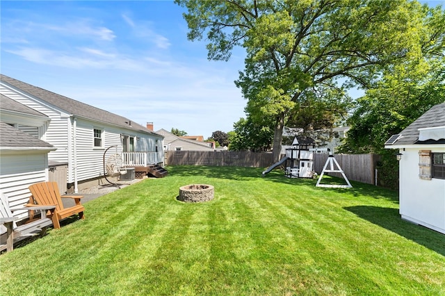 23 Revere St, Pawtucket, RI 02861 - view of yard with a playground, an outdoor fire pit, and central air condition unit