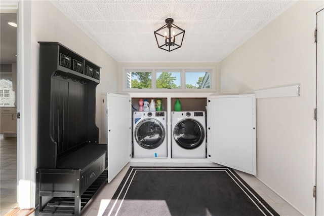 23 Revere St, Pawtucket, RI 02861 - laundry room with washing machine and clothes dryer and a chandelier