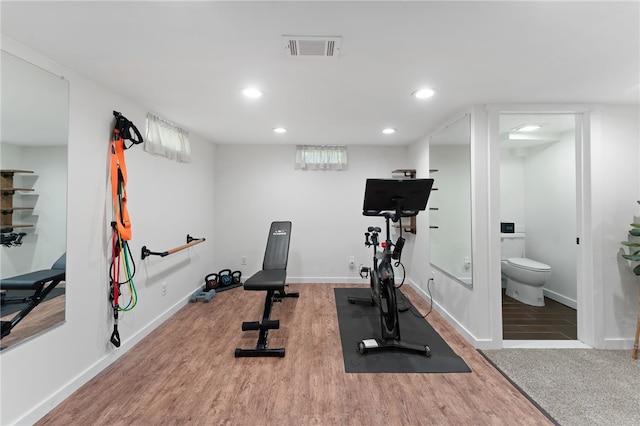 23 Revere St, Pawtucket, RI 02861 - workout area featuring wood finished floors, recessed lighting, and baseboards
