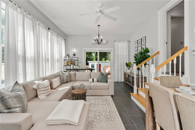 9 Elm St, North Providence, RI 02911 - living area with a chandelier, ceiling fan, and stairs
