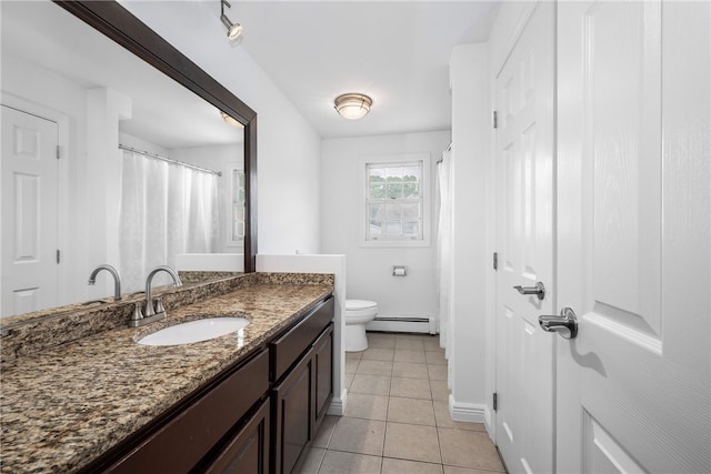 123 Forestwood Dr, North Providence, RI 02904 - full bath with vanity, a baseboard radiator, tile patterned floors, toilet, and baseboards