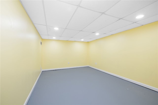 123 Forestwood Dr, North Providence, RI 02904 - empty room featuring recessed lighting, finished concrete floors, baseboards, and a drop ceiling