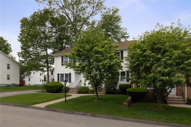 123 Forestwood Dr, North Providence, RI 02904 - view of property hidden behind natural elements with a front lawn