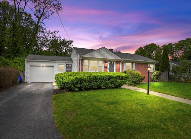 156 Davis Ave, Cranston, RI 02910 - single story home featuring an attached garage, driveway, a yard, and brick siding