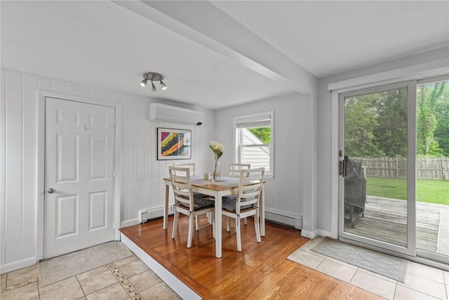 156 Davis Ave, Cranston, RI 02910 - dining space featuring a wall unit AC, a baseboard radiator, a baseboard heating unit, and baseboards