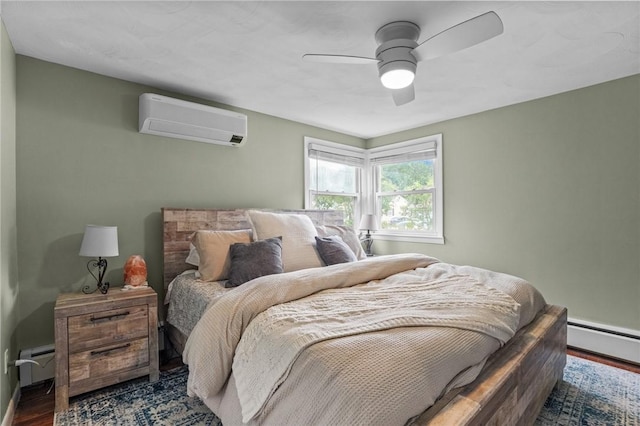 156 Davis Ave, Cranston, RI 02910 - bedroom with a wall unit AC, wood finished floors, a baseboard heating unit, a ceiling fan, and baseboards