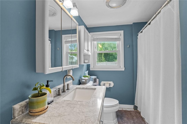 156 Davis Ave, Cranston, RI 02910 - full bath featuring toilet, vanity, a shower with shower curtain, tile patterned floors, and baseboards